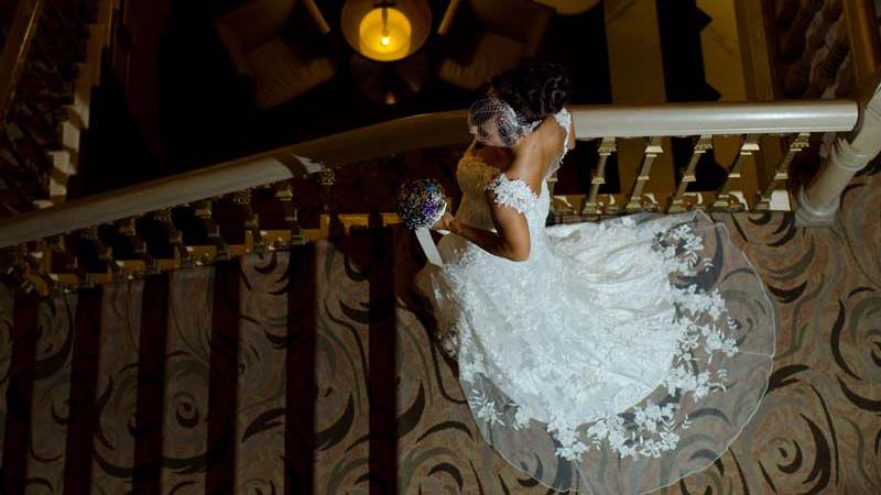 Bride rushes down stairwell in Chester