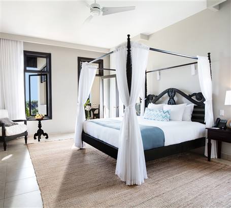 One Bedroom Suite Bedroom at THE CLIFF NEGRIL. 𝗙𝗿𝗼𝗺 𝗨𝗦𝗗 𝟲𝟱𝟬 𝗽𝗲𝗿 𝗻𝗶𝗴𝗵𝘁