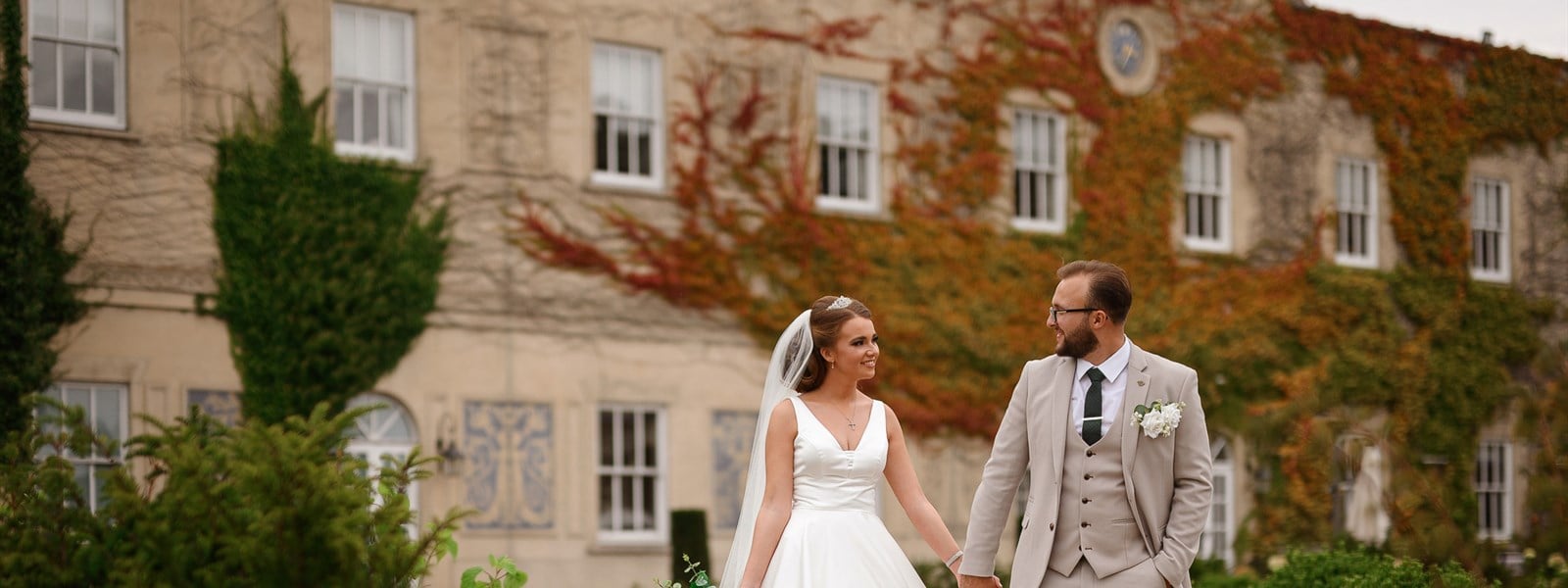 Pre & Post Wedding Packages Essex - Bride and Groom holding Hands