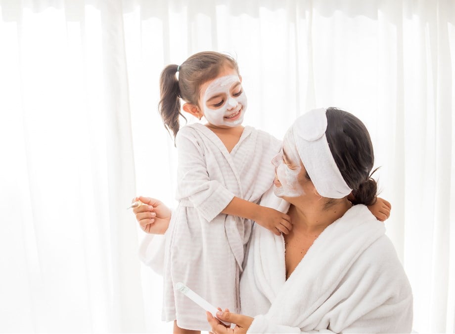 mother her young pretty daughter having 