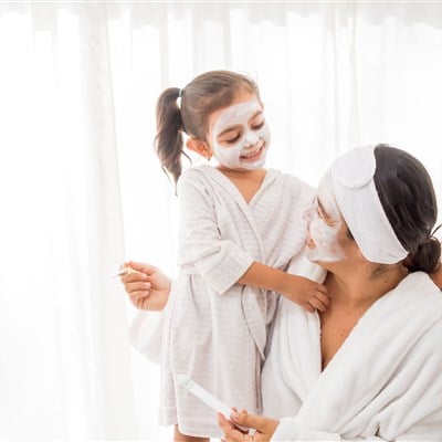 mother her young pretty daughter having 