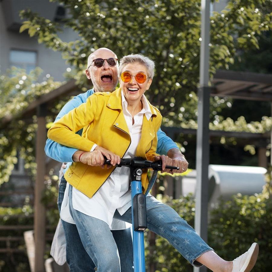 happy senior people fooling around