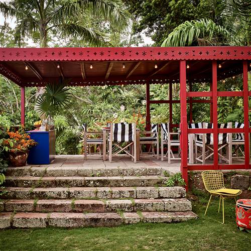Outdoor bar at GOLDEN ROCK INN. Best boutique and tropical hotel in Nevis
