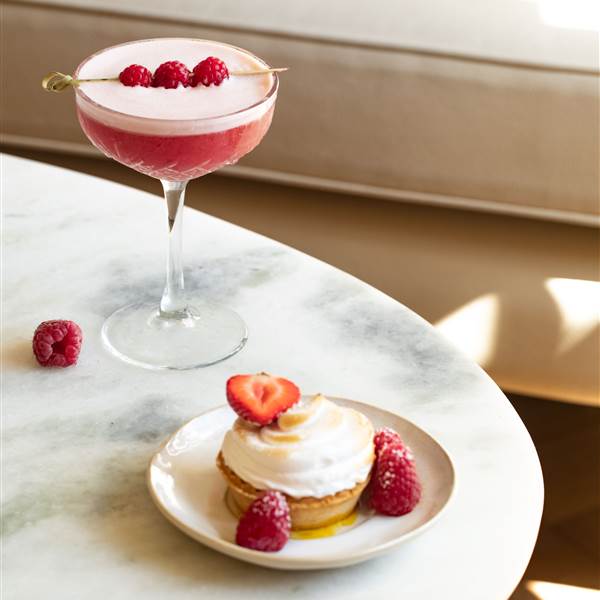 cocktail, a classic pre-Prohibition drink made with gin, lemon juice, raspberry syrup, and egg white