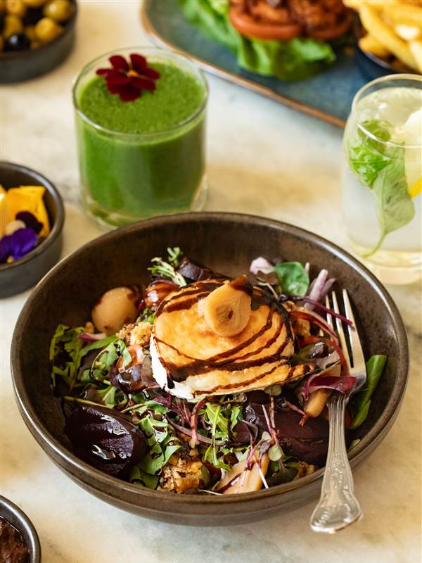  a salad with pancakes, along with a green smoothie, Killarney