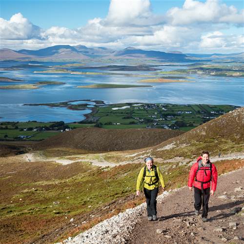 Walkers on the path up Croagh Patrick