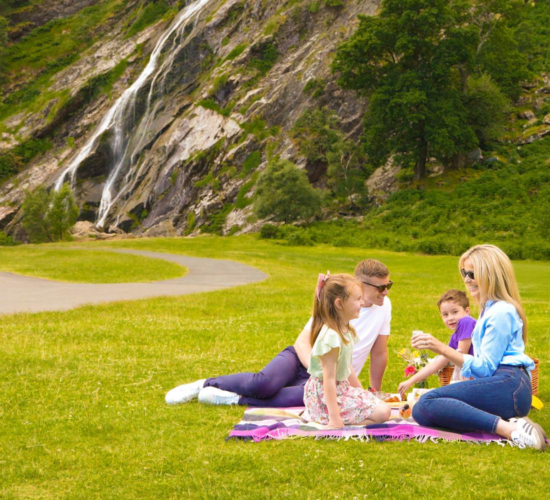 Family Picnic by waterfall