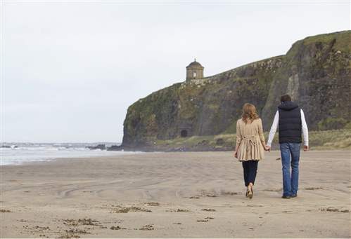 Couple Walking by the Beach - Readcastle Hotel
