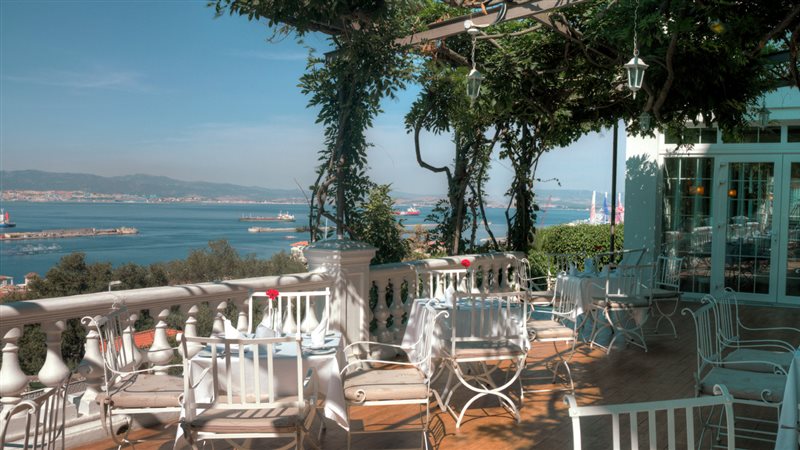 Outdoor terrace with views for dinning at The Rock Hotel in Gibrartar