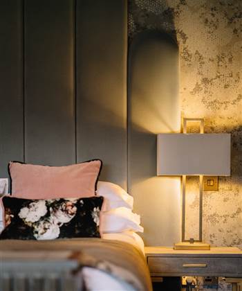 a bedroom at Saltmarshe Hall, an opulent hotel and wedding venue near Goole and Howden