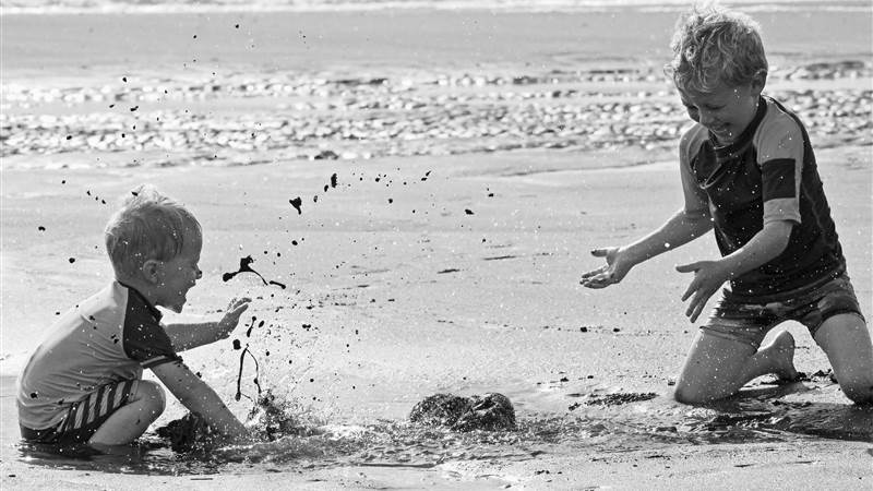 Children Playing on Local Beach