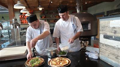 Pizza Chefs Making Pizza