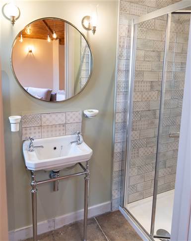 Two bed family cabin bathroom