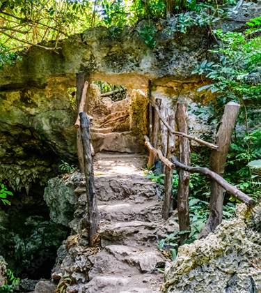 Bridge at entrance to Kuza Cave   550x61